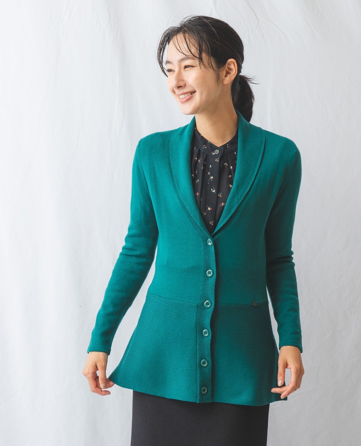 ペプラムニットカーディガン