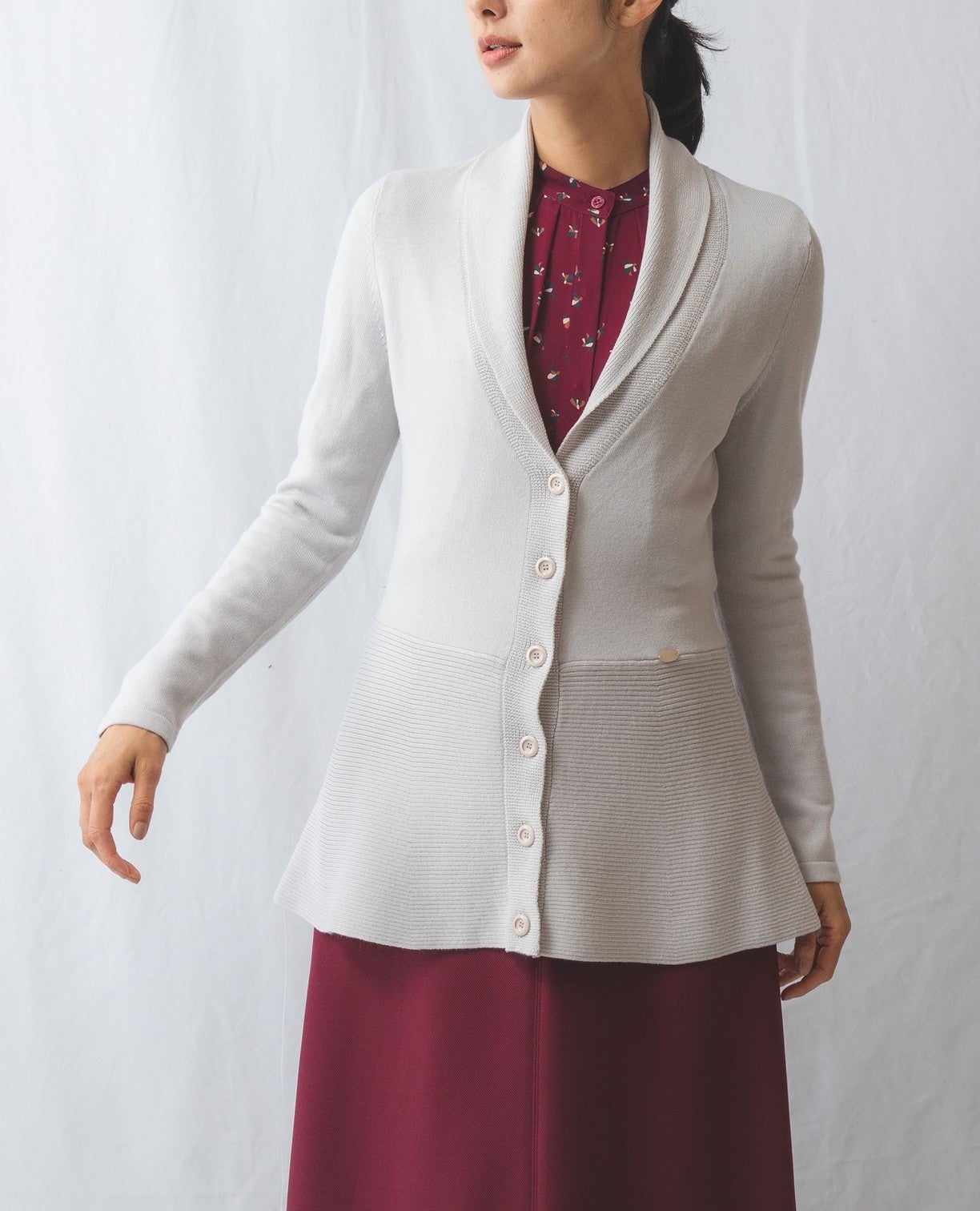 ペプラムニットカーディガン