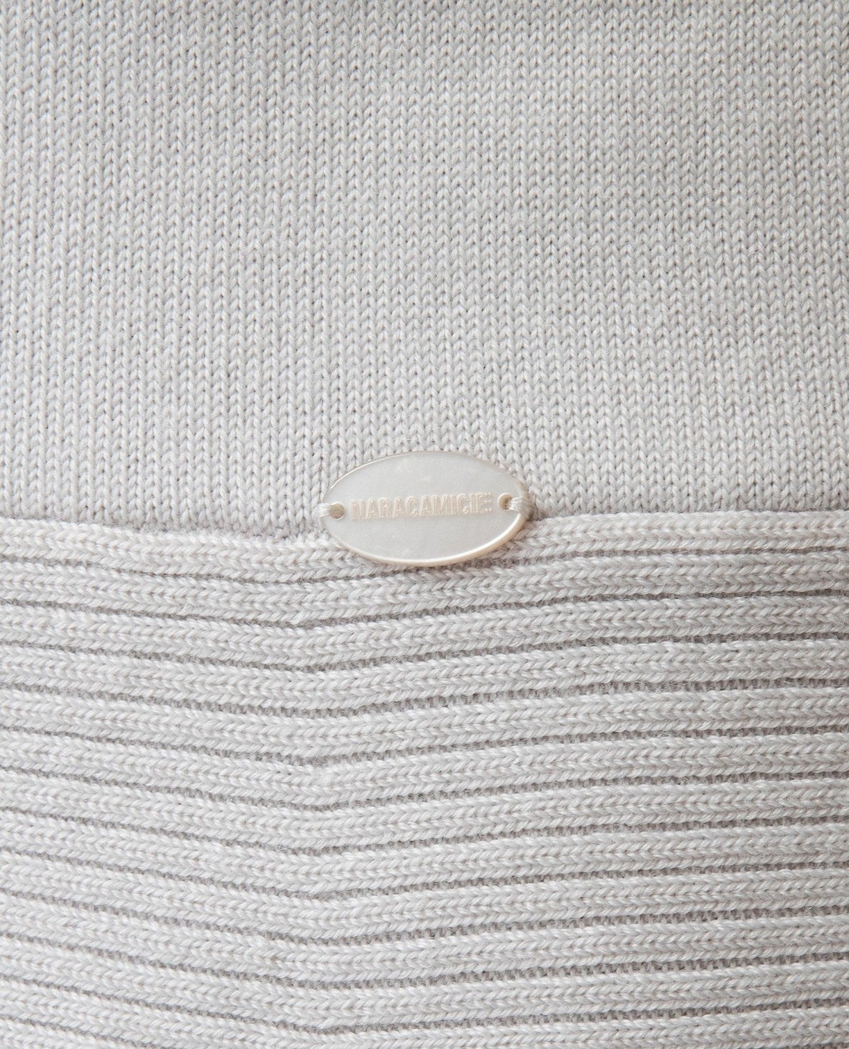 ペプラムニットカーディガン